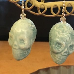 Pierced SS drop skeleton earring